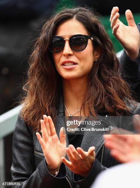 Xisca Perello girlfriend of Rafael Nadal of Spain watches as he receives his winners trophy after his straight set victory against Albert...