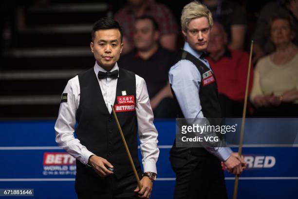 Marco Fu of Chinese Hong Kong reacts during his second round match against Neil Robertson of Australia on day nine of Betfred World Championship 2017...