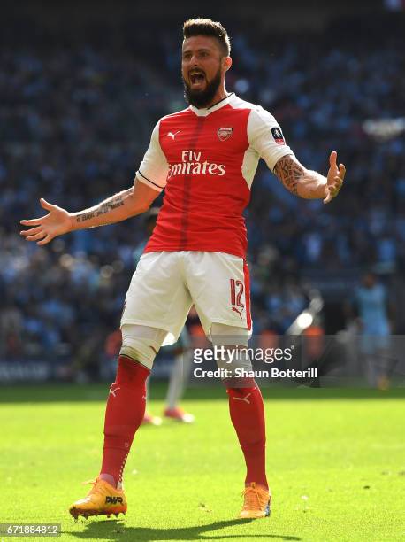 Olivier Giroud of Arsenal celebrates after his side's first goal by Nacho Monreal during the Emirates FA Cup Semi-Final match between Arsenal and...