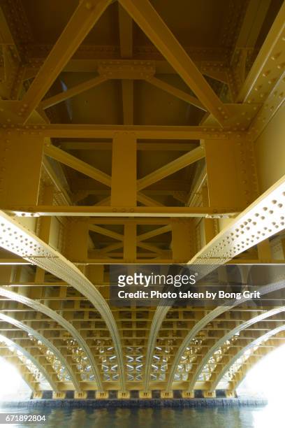 yellow bridge - 建物の骨組み stock pictures, royalty-free photos & images
