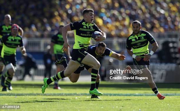Garry Ringrose of Leinster breaks clear to score a try during the European Rugby Champions Cup semi final match between ASM Clermont Auvergne and...