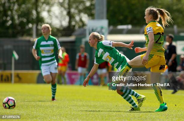 Nadia Lawrence of Yeovil Town Ladies beats Kate Longhurst of Liverpool Ladies FC to the ball during the WSL Spring Series Match between Yeovil Town...