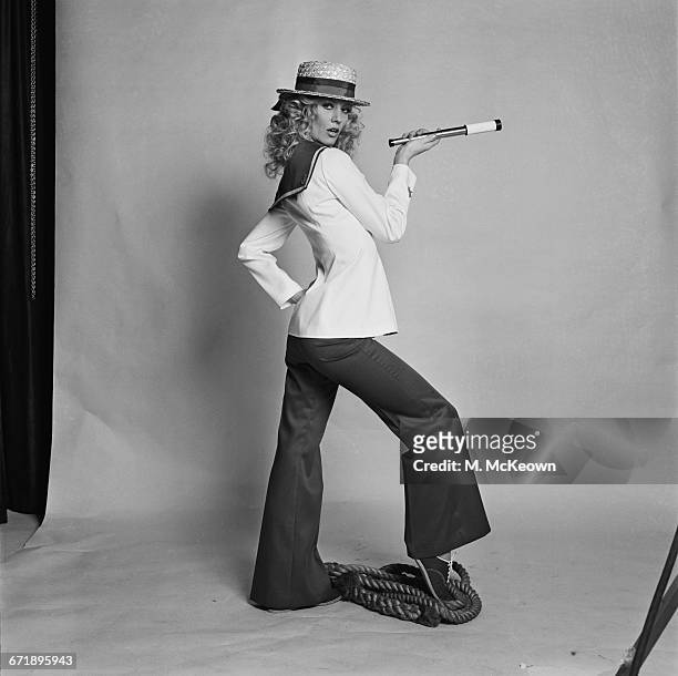 Nautical trouser suit modelled by English actress and model Vicki Hodge, UK, 20th October 1971.