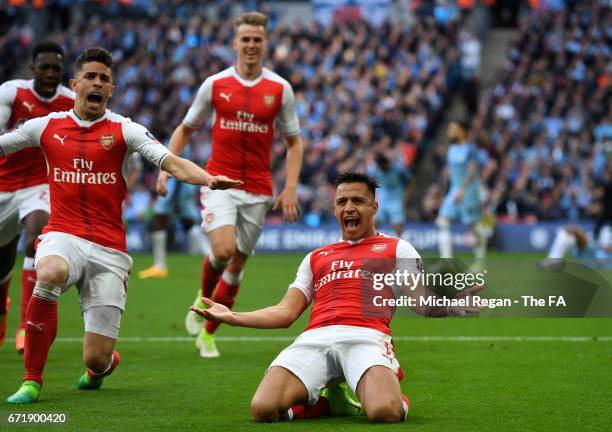 Alexis Sanchez of Arsenal celebrates scoring his side's second goal during the Emirates FA Cup Semi-Final match between Arsenal and Manchester City...