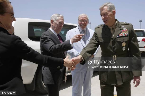Defense Secretary James Mattis , US Embassy Charge d'Affaires Mark Boulware and other members of the delegation are greeted by US Marine Corps...