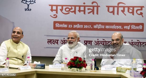 Prime Minister Narendra Modi, Home Minister Rajnath Singh, and BJP President Amit Shah, during a meeting with 13 Chief Ministers of BJP-ruled states...