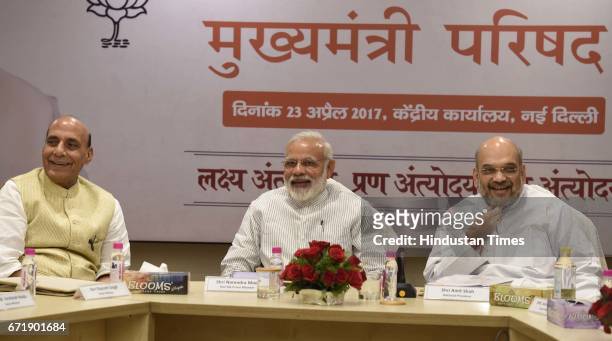 Prime Minister Narendra Modi, Home Minister Rajnath Singh, and BJP President Amit Shah, during a meeting with 13 Chief Ministers of BJP-ruled states...