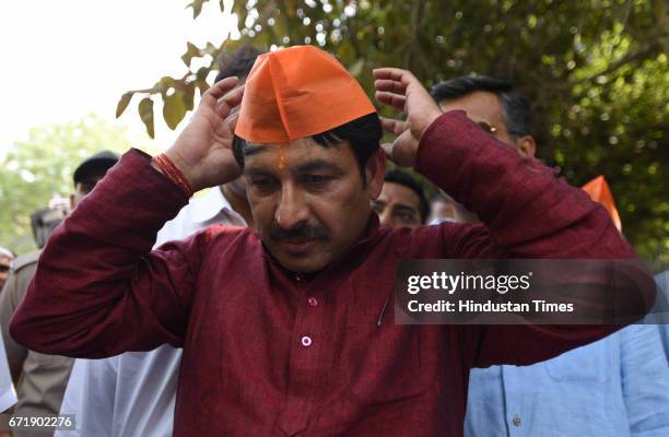 Delhi BJP President Manoj Tiwari with party workers during the MCD Elections at Vasundhra Enclave polling station, on April 23, 2017 in New Delhi,...