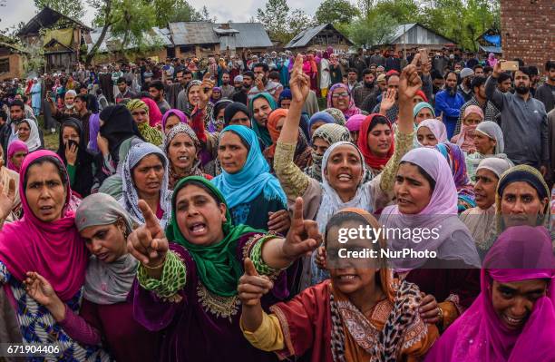 Kashmiri Muslim women shout anti Indian and pro Kashmir freedom slogans as they attend the funeral procession of Younis Maqbool Ganie, a pro Kashmir...