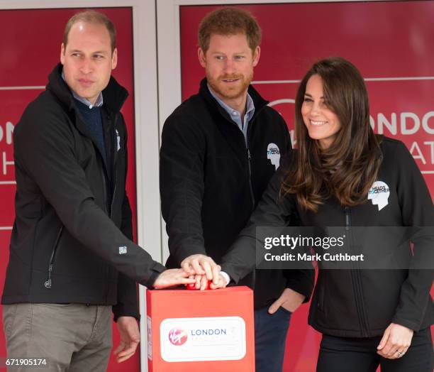 Prince William, Duke of Cambridge and Catherine, Duchess of Cambridge with Prince Harry at the blue start of the 2017 Virgin Money London Marathon on...