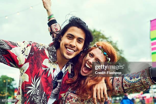 group of friends having fun at a music festival - festival goer stock pictures, royalty-free photos & images