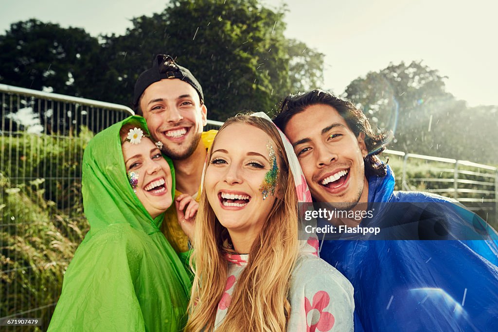 Group of friends having fun at a music festival