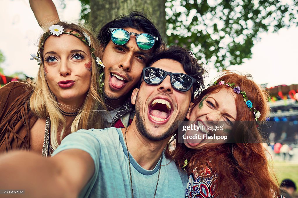 Group of friends having fun at a music festival
