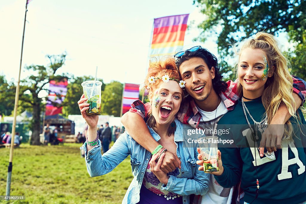 Group of friends having fun at a music festival