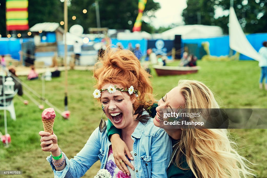 Group of friends having fun at a music festival