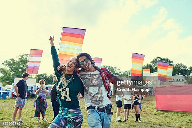group of friends having fun at a music festival - festival goer stock pictures, royalty-free photos & images