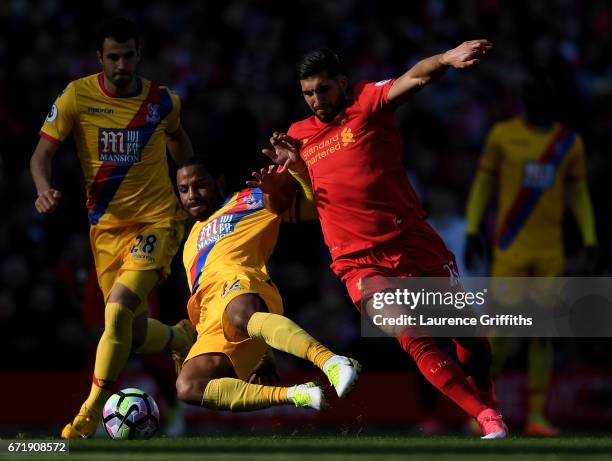 Emre Can of Liverpool is tackled by Jason Puncheon of Crystal Palace during the Premier League match between Liverpool and Crystal Palace at Anfield...