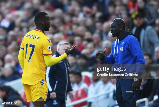 Christian Benteke of Crystal Palace celebrates scoring his side's first goal with his team mate Bakary Sako during the Premier League match between...