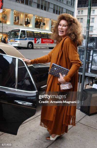 Jocelyn Wildenstein prepares to enter her Rolls Royce November 17, 2001 in New York City after lunching and shopping at Barney's.