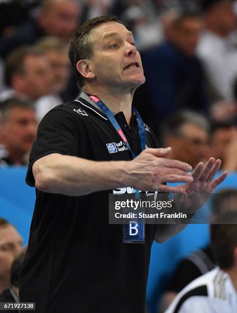 Alfred Gislason, head coach of Kiel reacts during the EHF Champions League Quarter Final first leg match between THW Kiel and Barcelona at the...