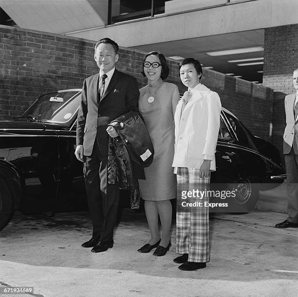 Lee Kuan Yew , the first Prime Minister of Singapore, arrives at London Airport with his wife Kwa Geok Choo and their daughter Lee Wei Ling, UK, 30th...