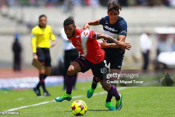 Jose Carlos Van Rankin of Pumas fights for the ball with Freddy Hinestroza of Veracruz during the 15th round match between Pumas UNAM and Veracruz as...