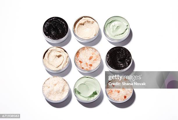 clay masks and salt treatments on a grid - homemade mask stock pictures, royalty-free photos & images