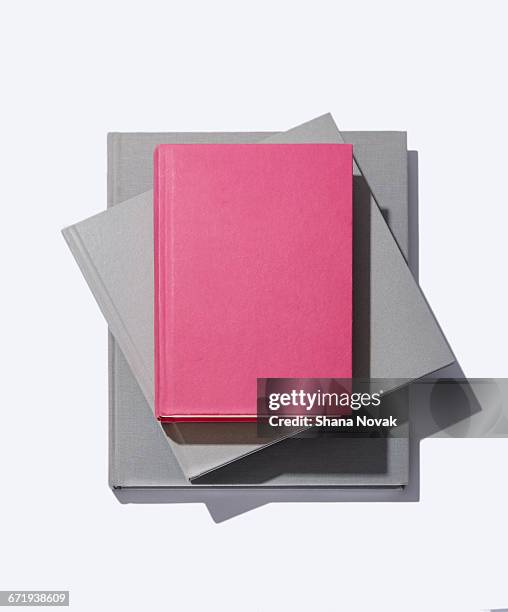 stack of linen books - stack of books stock pictures, royalty-free photos & images