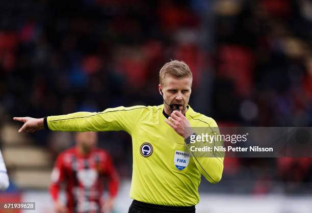 Referee Glenn Nyberg points at the penalty spot during the Allsvenskan match between Ostersunds FK and IFK Goteborg at Jamtkraft Arena on April 23,...