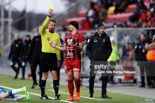 Douglas Bergqvist of Ostersunds FK is shown a yellow card by referee Glenn Nyberg during the Allsvenskan match between Ostersunds FK and IFK Goteborg...