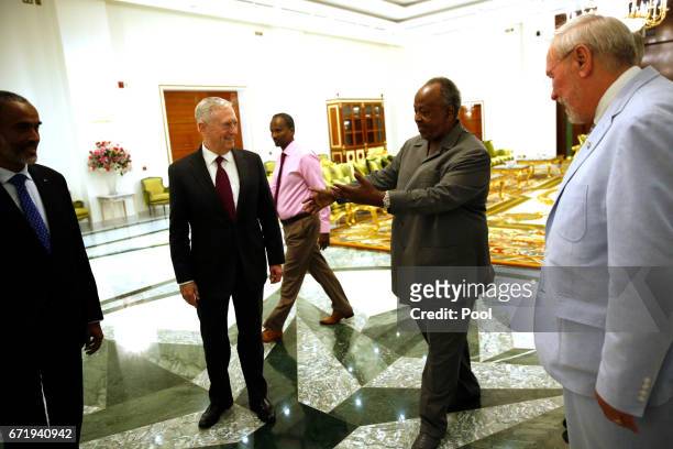 Djibouti's President Ismail Omar Guelleh welcomes U.S. Defense Secretary James Mattis at the Presidential Palace on April 23, 2017 in Djibouti....