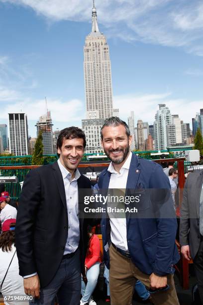 Retired soccer players Raul Gonzalez and Gianluca Zambrotta attend a roofop viewing party of El Clasico - Real Madrid CF vs FC Barcelona hosted by...