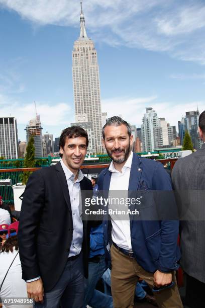 Retired soccer players Raul Gonzalez and Gianluca Zambrotta attend a roofop viewing party of El Clasico - Real Madrid CF vs FC Barcelona hosted by...