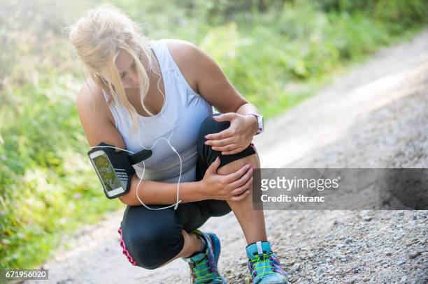 sport injury - human knee stock pictures, royalty-free photos & images