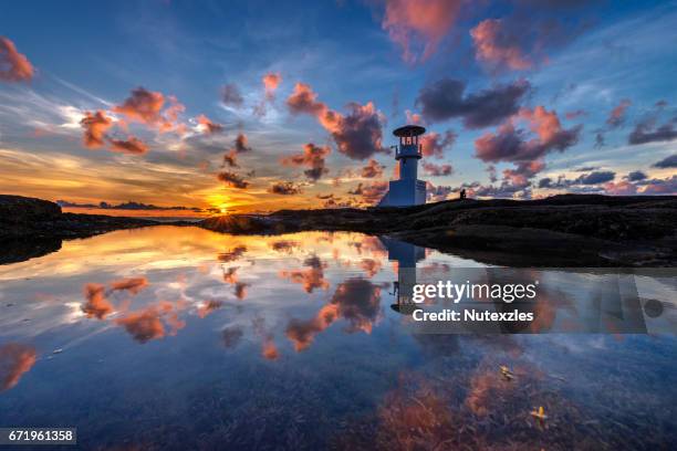 lighthouse at andaman sea in twilight - beachy head stock pictures, royalty-free photos & images
