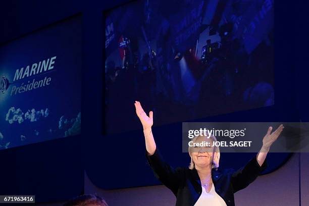 French presidential election candidate for the far-right Front National party Marine Le Pen delivers a speech in Henin-Beaumont, on April 23 after...