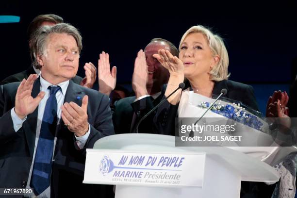 French presidential election candidate for the far-right Front National party Marine Le Pen delivers a speech in Henin-Beaumont, on April 23 after...