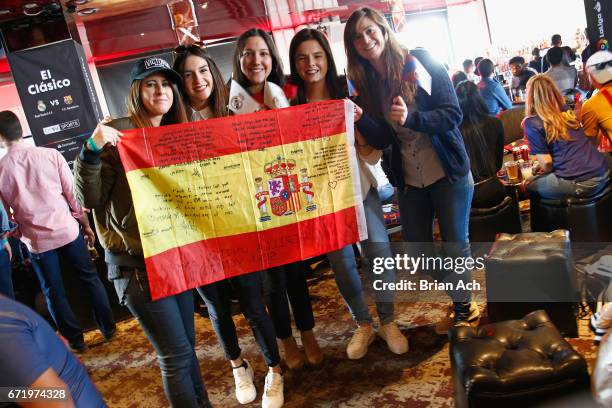 Fans attend a roofop viewing party of El Clasico - Real Madrid CF vs FC Barcelona hosted by LaLiga at 230 Fifth Avenue on April 23, 2017 in New York...