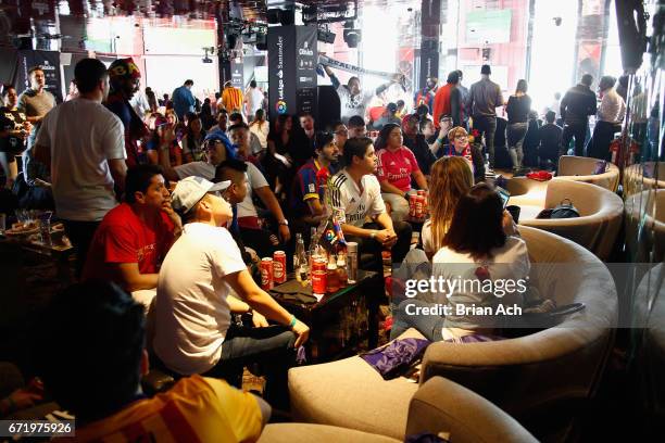 Fans attend a roofop viewing party of El Clasico - Real Madrid CF vs FC Barcelona hosted by LaLiga at 230 Fifth Avenue on April 23, 2017 in New York...