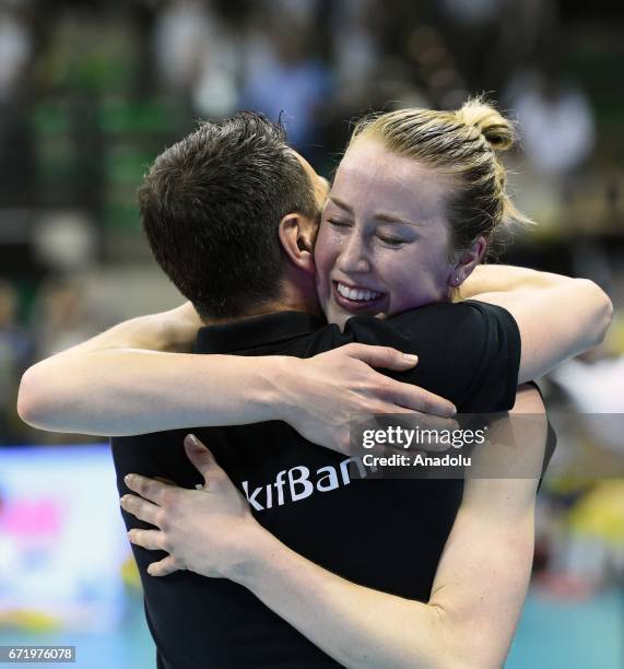 Head coach Giovanni Guidetti and Kimberly Hill of VakifBank Istanbul celebrate their first place after the Volleyball European Champions League Women...