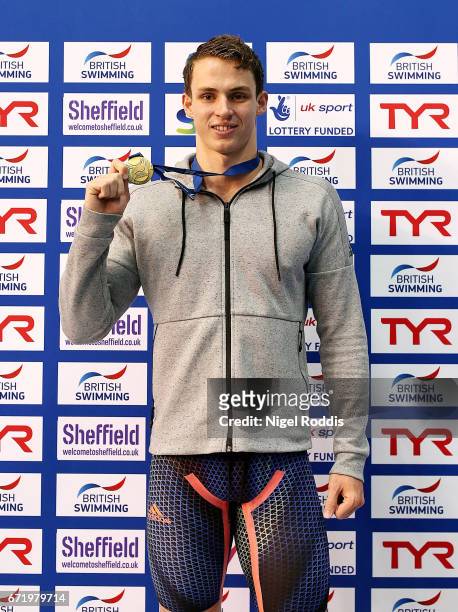 Benjamin Proud of Plymouth LEA poses with his medal after winning the Mens Open 50m Butterfly Final on day six of the 2017 British Swimming...