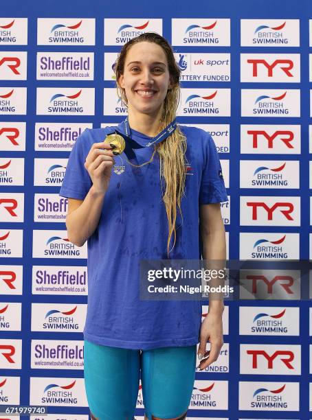 Alys Thomas of Swansea Aq poses with her medal after winning the Womens Open 100m Butterfly Final on day six of the 2017 British Swimming...