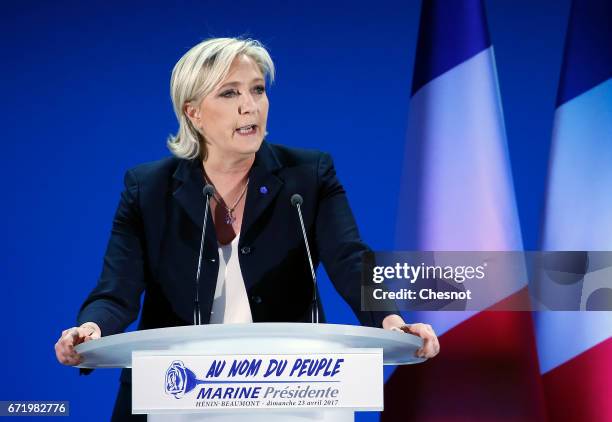 National Front leader Marine Le Pen addresses activists at the Espace Francios Mitterrand on April 23, 2017 in Henin Beaumont, France. According to...