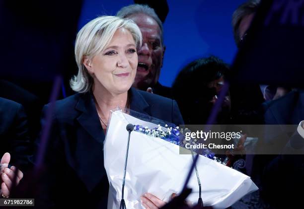 National Front leader Marine Le Pen addresses activists at the Espace Francios Mitterrand on April 23, 2017 in Henin Beaumont, France. According to...