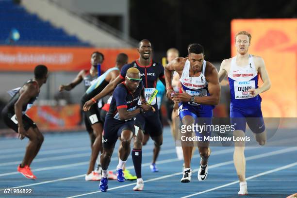 Theo Campbell of Great Britain and Thomas Jordier of France compete in heat one of the Men's 4 x 400 Relay during the IAAF/BTC World Relays Bahamas...