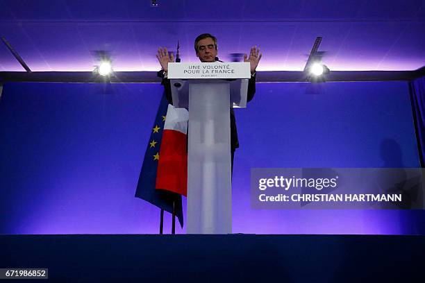 French presidential election candidate for the right-wing Les Republicains party Francois Fillon delivers a speech at his campaign headquarters in...