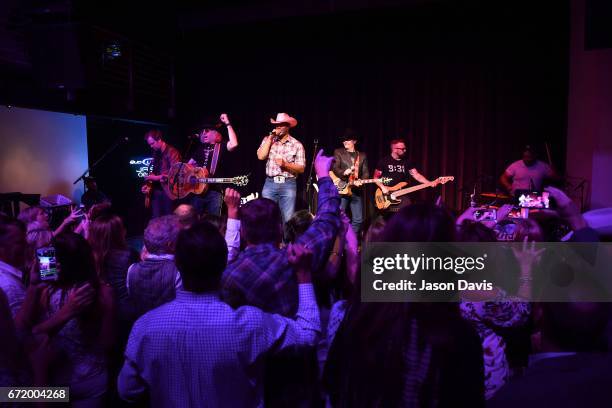 Recording Artists Cowboy Troy and Big Kenny and John Rich of Big & Rich perform during a private concert for Pediatric Cancer research on April 22,...