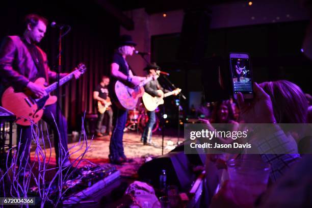 Recording Artists Big Kenny and John Rich of Big & Rich perform during a private concert for Pediatric Cancer research on April 22, 2017 in...