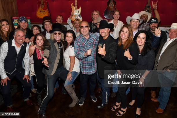 Guests pose with Recording Artists Big Kenny and John Rich of Big & Rich, Gretchen Wilson, Randy Houser and Cowboy Troy during a private concert for...
