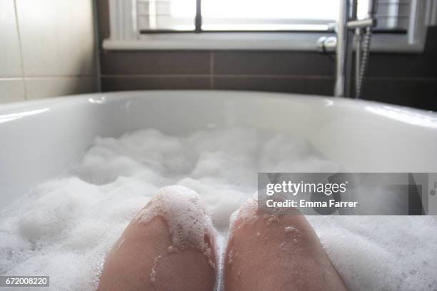 point of view - person in bath - bubble bath stock pictures, royalty-free photos & images